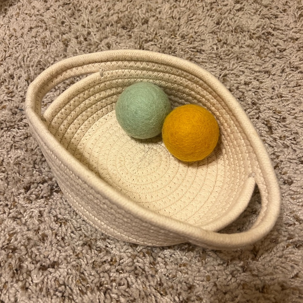 Lovevery the inspector cotton treasure basket with two felt balls